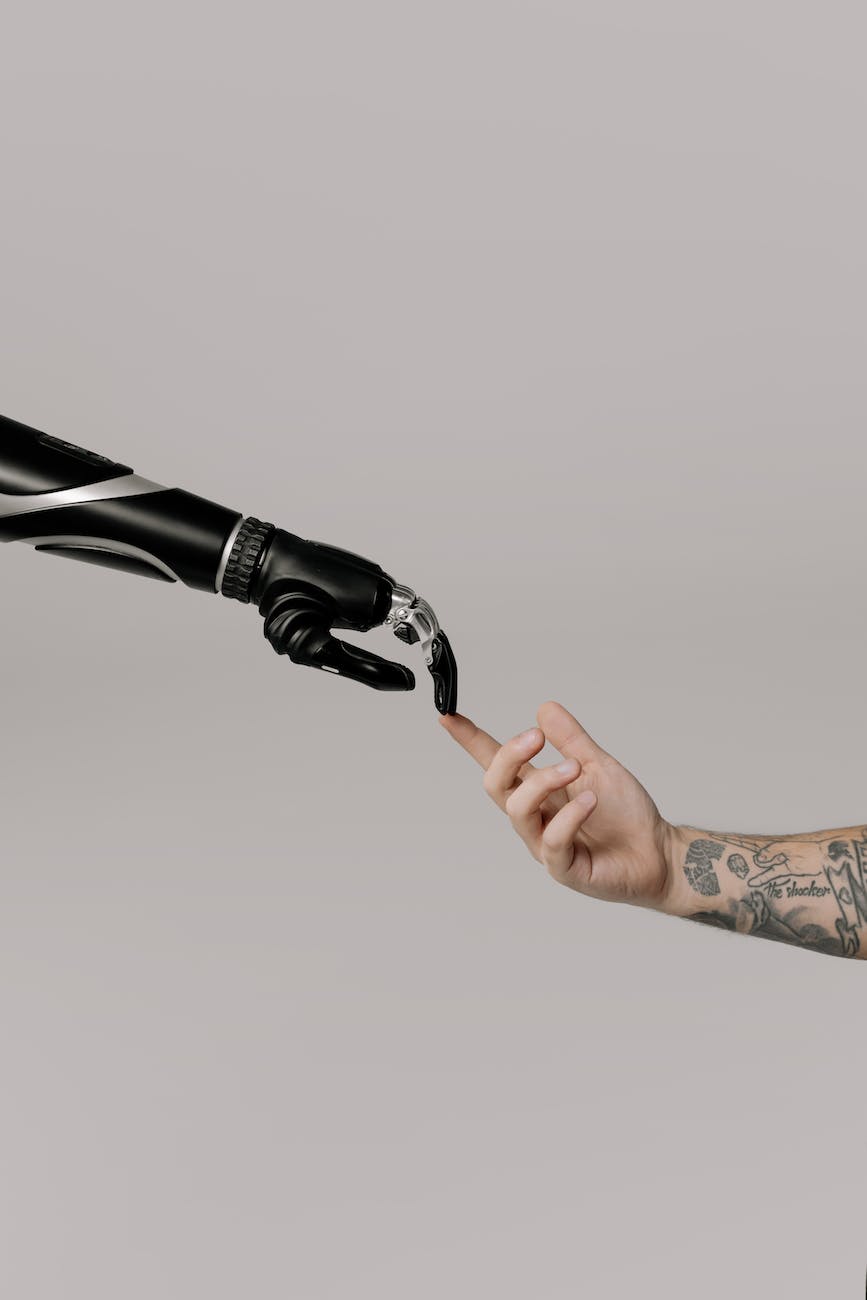 a person holding a prosthetic arm